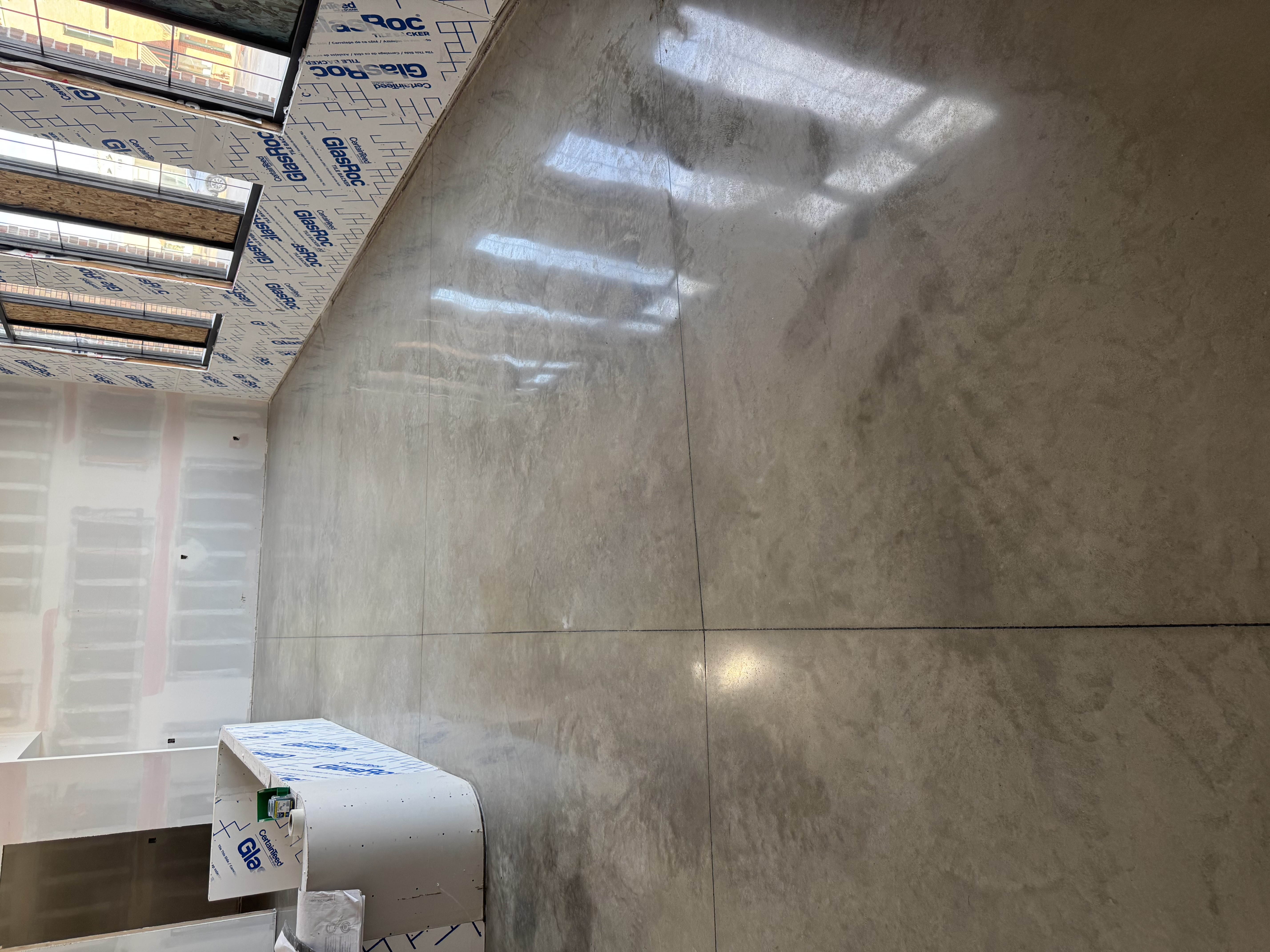 Residential living space transformed with stylish epoxy flooring
